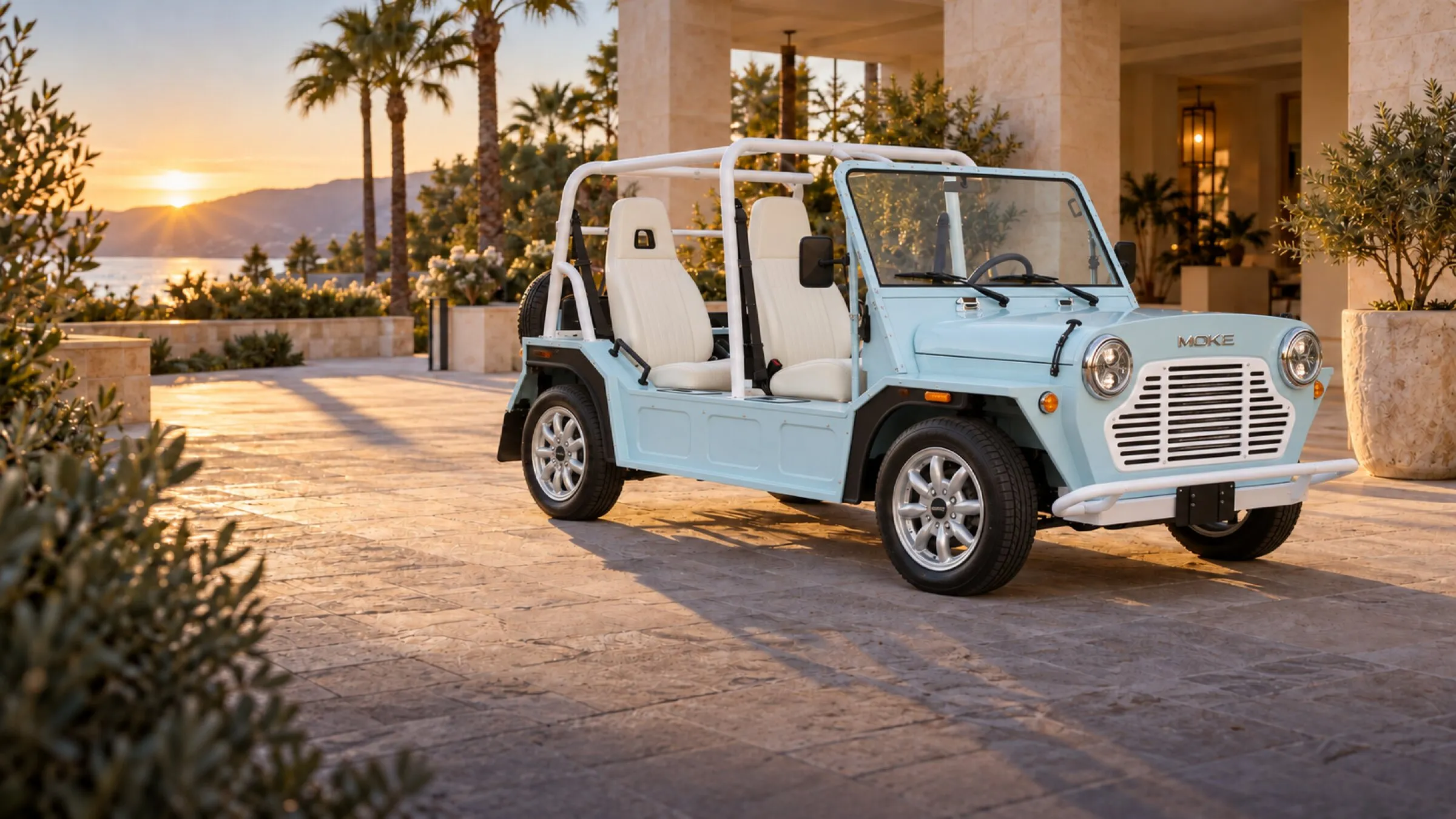 An electric Moke in a resort motor court at golden hour